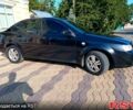 Черный Шевроле Лачетти, объемом двигателя 1.8 л и пробегом 279 тыс. км за 4599 $, фото 6 на Automoto.ua