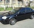 Черный Шевроле Лачетти, объемом двигателя 1.8 л и пробегом 116 тыс. км за 8700 $, фото 1 на Automoto.ua