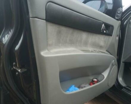 Черный Шевроле Лачетти, объемом двигателя 1.8 л и пробегом 193 тыс. км за 6150 $, фото 29 на Automoto.ua