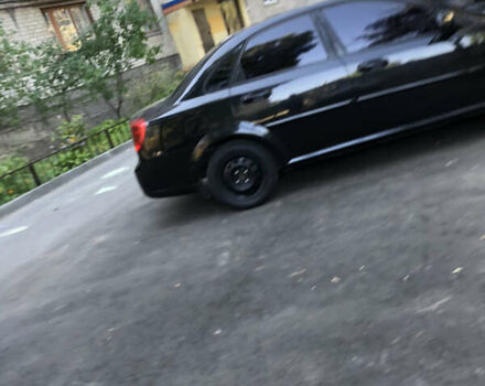 Черный Шевроле Лачетти, объемом двигателя 1.8 л и пробегом 153 тыс. км за 6000 $, фото 5 на Automoto.ua