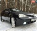 Черный Шевроле Лачетти, объемом двигателя 1.8 л и пробегом 255 тыс. км за 5950 $, фото 1 на Automoto.ua