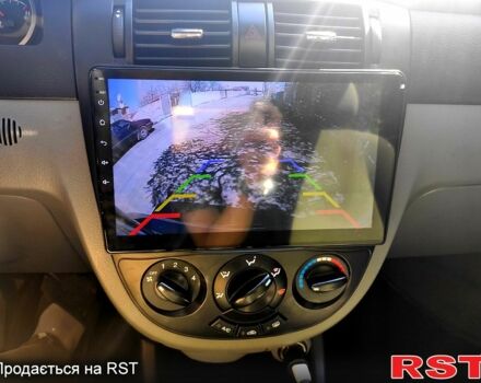 Черный Шевроле Лачетти, объемом двигателя 1.6 л и пробегом 160 тыс. км за 7000 $, фото 5 на Automoto.ua