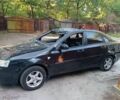 Черный Шевроле Лачетти, объемом двигателя 1.6 л и пробегом 160 тыс. км за 1350 $, фото 4 на Automoto.ua