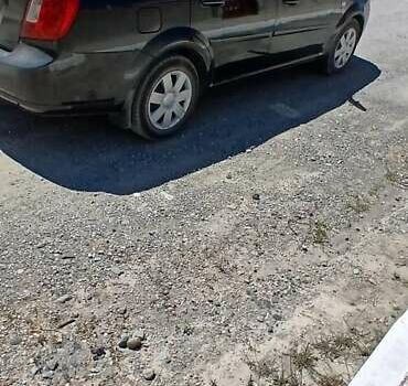 Чорний Шевроле Лачетті, об'ємом двигуна 1.8 л та пробігом 82 тис. км за 7500 $, фото 6 на Automoto.ua