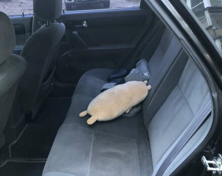 Черный Шевроле Лачетти, объемом двигателя 1.8 л и пробегом 153 тыс. км за 6000 $, фото 1 на Automoto.ua