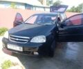 Черный Шевроле Лачетти, объемом двигателя 2 л и пробегом 120 тыс. км за 3000 $, фото 1 на Automoto.ua