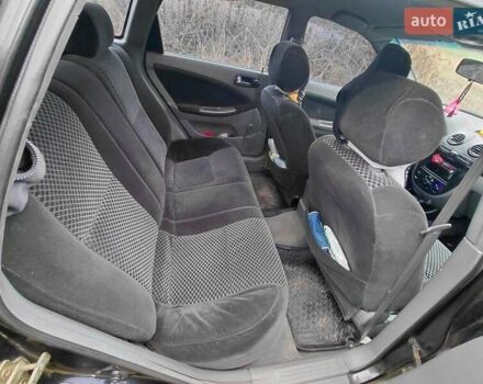 Черный Шевроле Лачетти, объемом двигателя 1.8 л и пробегом 235 тыс. км за 3300 $, фото 9 на Automoto.ua