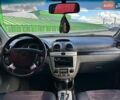 Черный Шевроле Лачетти, объемом двигателя 1.8 л и пробегом 273 тыс. км за 4690 $, фото 12 на Automoto.ua