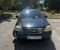 Черный Шевроле Лачетти, объемом двигателя 1.8 л и пробегом 184 тыс. км за 4202 $, фото 1 на Automoto.ua