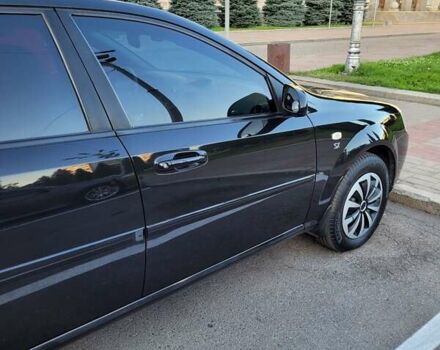 Чорний Шевроле Лачетті, об'ємом двигуна 1.8 л та пробігом 58 тис. км за 9950 $, фото 22 на Automoto.ua
