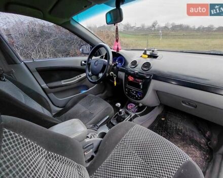 Черный Шевроле Лачетти, объемом двигателя 1.8 л и пробегом 235 тыс. км за 3300 $, фото 11 на Automoto.ua