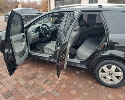 Черный Шевроле Лачетти, объемом двигателя 1.8 л и пробегом 190 тыс. км за 4300 $, фото 11 на Automoto.ua