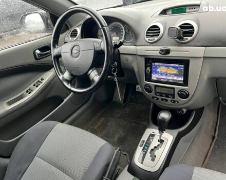 Черный Шевроле Лачетти, объемом двигателя 1.8 л и пробегом 293 тыс. км за 4190 $, фото 37 на Automoto.ua