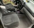 Черный Шевроле Лачетти, объемом двигателя 1.8 л и пробегом 235 тыс. км за 3300 $, фото 6 на Automoto.ua