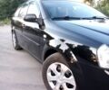 Черный Шевроле Лачетти, объемом двигателя 1.8 л и пробегом 300 тыс. км за 3300 $, фото 1 на Automoto.ua