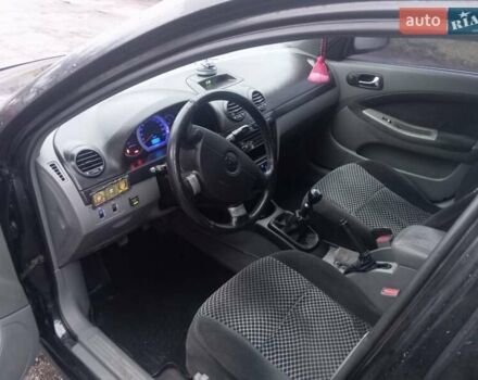 Черный Шевроле Лачетти, объемом двигателя 1.8 л и пробегом 230 тыс. км за 4350 $, фото 8 на Automoto.ua