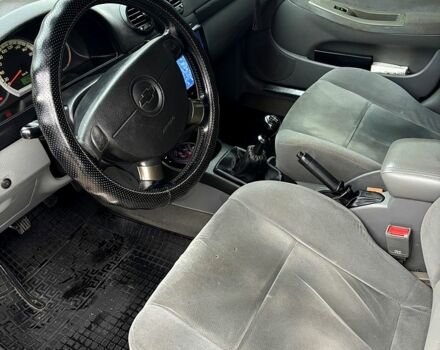 Черный Шевроле Лачетти, объемом двигателя 1.8 л и пробегом 320 тыс. км за 4000 $, фото 4 на Automoto.ua