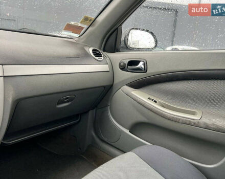 Черный Шевроле Лачетти, объемом двигателя 1.8 л и пробегом 293 тыс. км за 4190 $, фото 26 на Automoto.ua