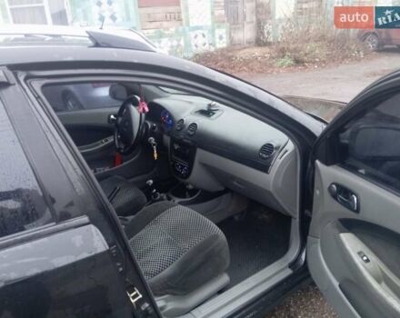 Черный Шевроле Лачетти, объемом двигателя 1.8 л и пробегом 230 тыс. км за 4350 $, фото 7 на Automoto.ua