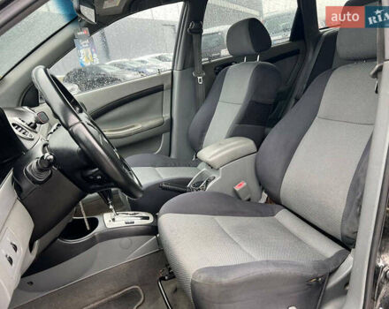 Черный Шевроле Лачетти, объемом двигателя 1.8 л и пробегом 293 тыс. км за 4190 $, фото 31 на Automoto.ua