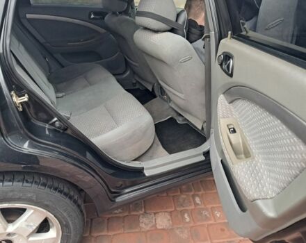 Черный Шевроле Лачетти, объемом двигателя 1.8 л и пробегом 190 тыс. км за 4300 $, фото 13 на Automoto.ua