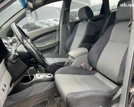 Черный Шевроле Лачетти, объемом двигателя 1.8 л и пробегом 293 тыс. км за 4190 $, фото 31 на Automoto.ua