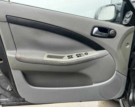 Черный Шевроле Лачетти, объемом двигателя 1.8 л и пробегом 293 тыс. км за 4190 $, фото 14 на Automoto.ua