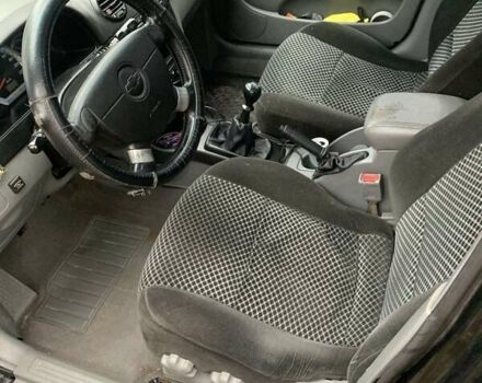 Черный Шевроле Лачетти, объемом двигателя 1.8 л и пробегом 235 тыс. км за 3300 $, фото 7 на Automoto.ua