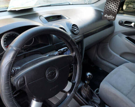 Черный Шевроле Лачетти, объемом двигателя 1.8 л и пробегом 257 тыс. км за 4200 $, фото 16 на Automoto.ua