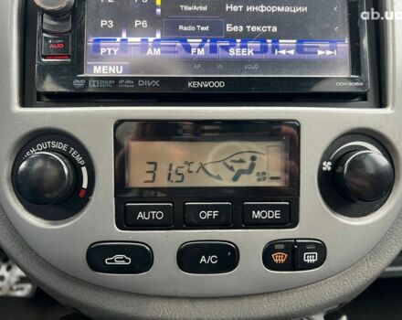 Черный Шевроле Лачетти, объемом двигателя 1.8 л и пробегом 293 тыс. км за 4190 $, фото 24 на Automoto.ua