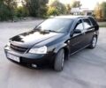 Черный Шевроле Лачетти, объемом двигателя 1.8 л и пробегом 300 тыс. км за 3300 $, фото 1 на Automoto.ua