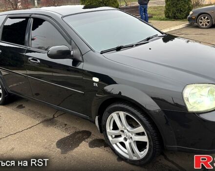 Черный Шевроле Лачетти, объемом двигателя 1.8 л и пробегом 320 тыс. км за 4000 $, фото 8 на Automoto.ua