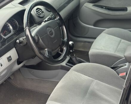 Черный Шевроле Лачетти, объемом двигателя 1.8 л и пробегом 234 тыс. км за 3350 $, фото 6 на Automoto.ua