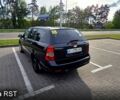 Черный Шевроле Лачетти, объемом двигателя 1.8 л и пробегом 303 тыс. км за 2970 $, фото 3 на Automoto.ua