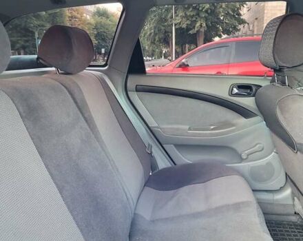 Чорний Шевроле Лачетті, об'ємом двигуна 1.8 л та пробігом 58 тис. км за 9950 $, фото 54 на Automoto.ua