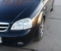 Черный Шевроле Лачетти, объемом двигателя 1.8 л и пробегом 210 тыс. км за 3800 $, фото 1 на Automoto.ua