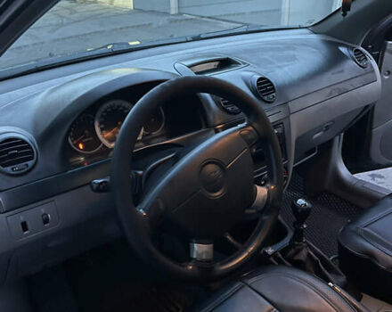 Чорний Шевроле Лачетті, об'ємом двигуна 1.8 л та пробігом 237 тис. км за 3599 $, фото 13 на Automoto.ua