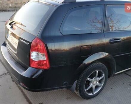 Черный Шевроле Лачетти, объемом двигателя 1.8 л и пробегом 210 тыс. км за 3800 $, фото 5 на Automoto.ua