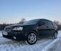 Черный Шевроле Лачетти, объемом двигателя 1.8 л и пробегом 241 тыс. км за 4100 $, фото 12 на Automoto.ua