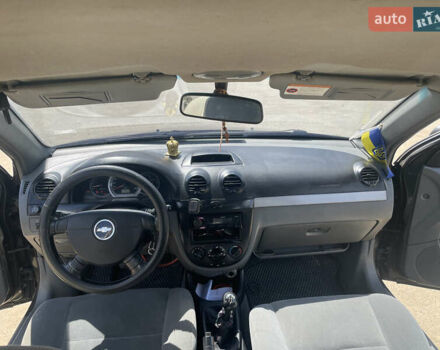 Черный Шевроле Лачетти, объемом двигателя 1.8 л и пробегом 350 тыс. км за 3400 $, фото 11 на Automoto.ua