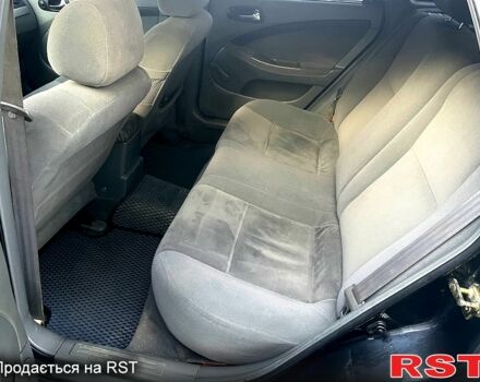 Черный Шевроле Лачетти, объемом двигателя 1.8 л и пробегом 350 тыс. км за 3600 $, фото 10 на Automoto.ua