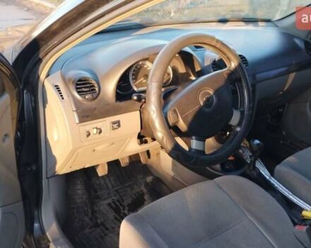 Черный Шевроле Лачетти, объемом двигателя 1.8 л и пробегом 210 тыс. км за 3800 $, фото 16 на Automoto.ua