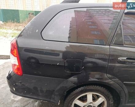 Черный Шевроле Лачетти, объемом двигателя 1.6 л и пробегом 193 тыс. км за 4500 $, фото 4 на Automoto.ua