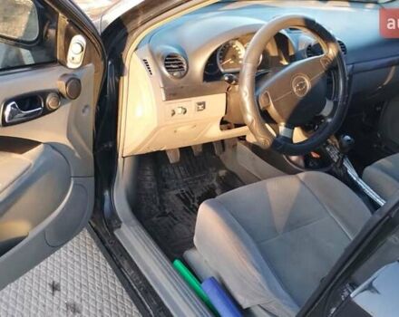 Черный Шевроле Лачетти, объемом двигателя 1.8 л и пробегом 210 тыс. км за 3800 $, фото 11 на Automoto.ua