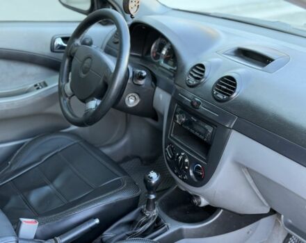 Черный Шевроле Лачетти, объемом двигателя 1.8 л и пробегом 220 тыс. км за 3499 $, фото 12 на Automoto.ua