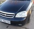 Черный Шевроле Лачетти, объемом двигателя 1.8 л и пробегом 210 тыс. км за 3800 $, фото 2 на Automoto.ua