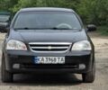 Черный Шевроле Лачетти, объемом двигателя 1.8 л и пробегом 158 тыс. км за 4707 $, фото 1 на Automoto.ua