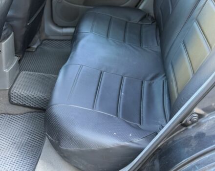 Черный Шевроле Лачетти, объемом двигателя 1.8 л и пробегом 220 тыс. км за 3499 $, фото 10 на Automoto.ua