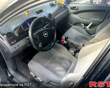 Черный Шевроле Лачетти, объемом двигателя 1.8 л и пробегом 350 тыс. км за 3600 $, фото 11 на Automoto.ua