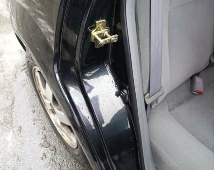 Черный Шевроле Лачетти, объемом двигателя 1.6 л и пробегом 193 тыс. км за 4500 $, фото 48 на Automoto.ua